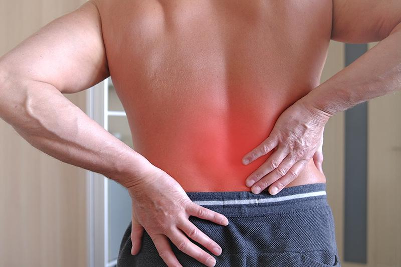 A man suffering from a herniated disc