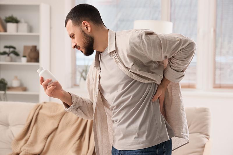 A man recovering from slipped disc treatment