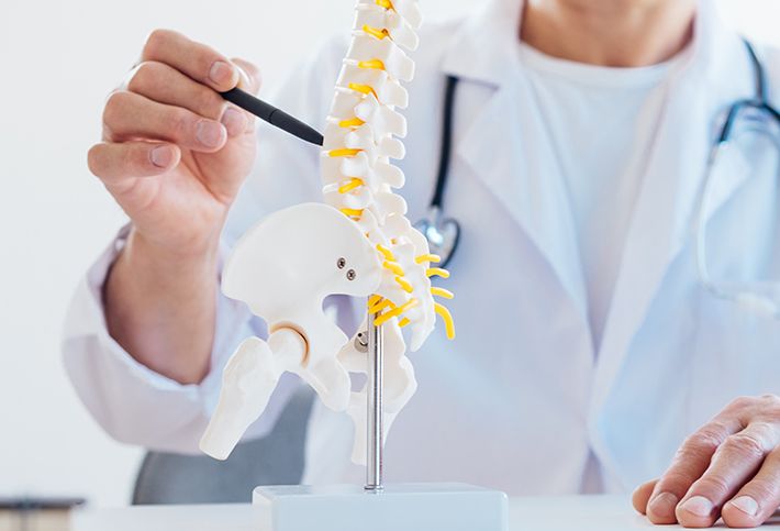 Physician Explaining Lumbar Spinal Stenosis