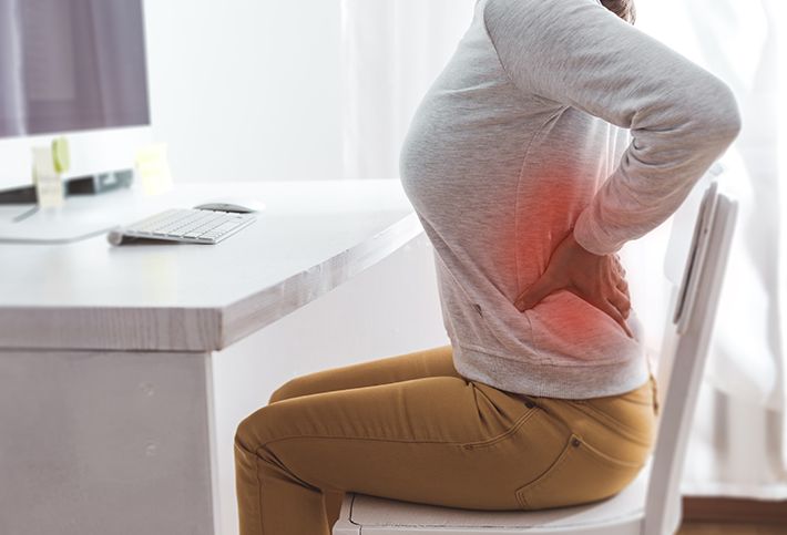Woman Suffering from Lower Back Pain