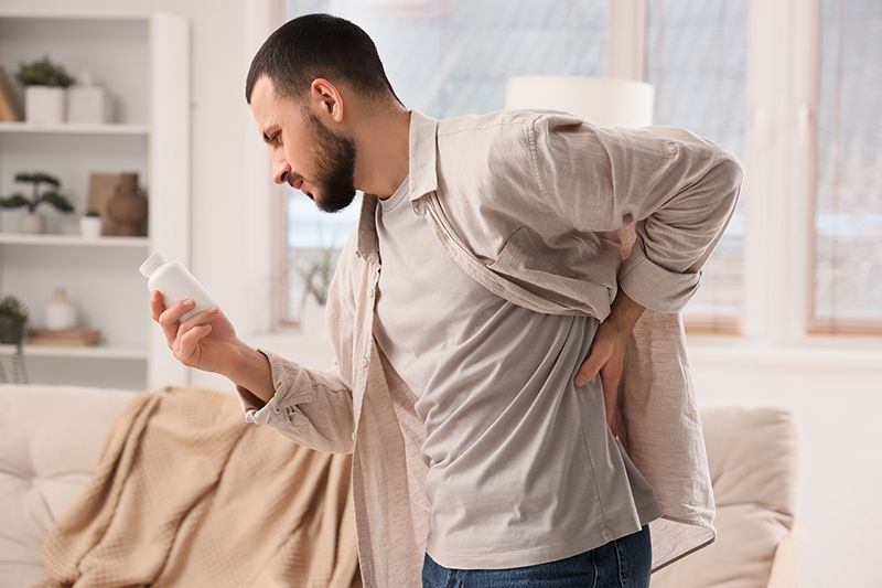 A man recovering from slipped disc treatment